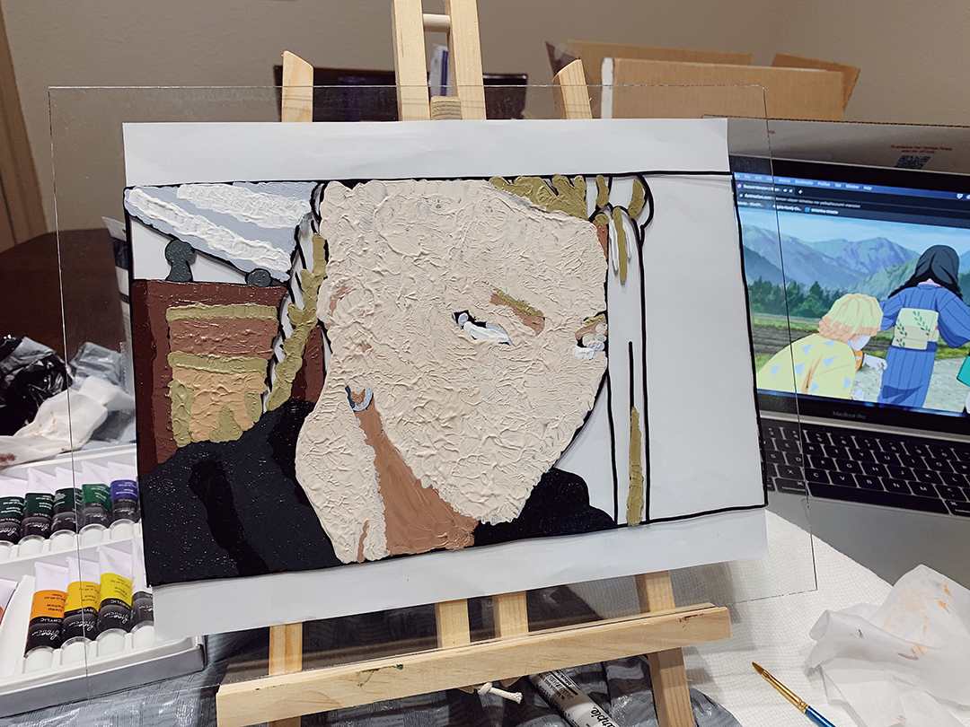 A glass acrylic painting process in progress